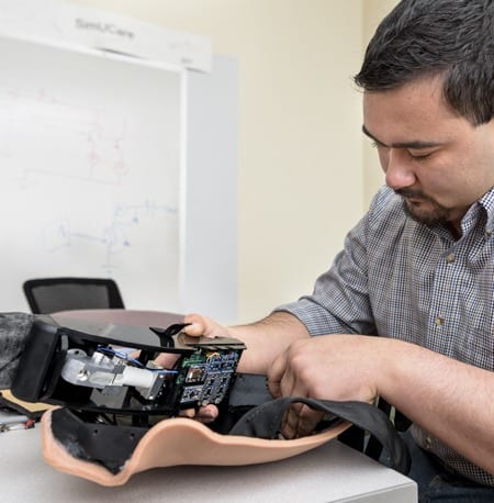 Matthew Eizardo (above right) worked on Avtrach development as an engineering student and now is one of Avkin’s full-time staff members.