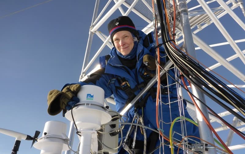 Dana Veron checks on equipment in Antarctica