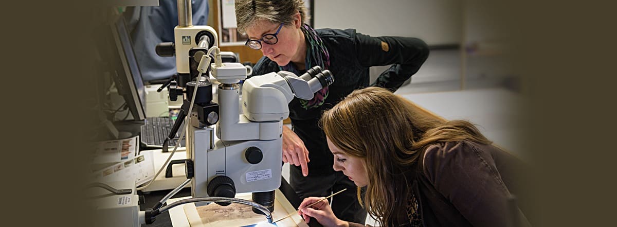 Associate Prof. Julie McGee (left), an expert curator, helps students look for the  hidden gems in collections that offer few clues.