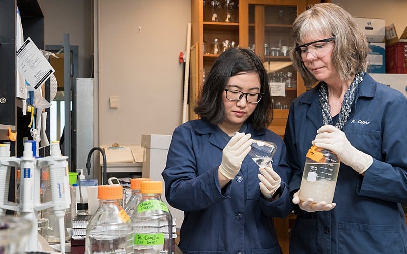 Kathryn Coyne (right) and doctoral student Yanfei Wang