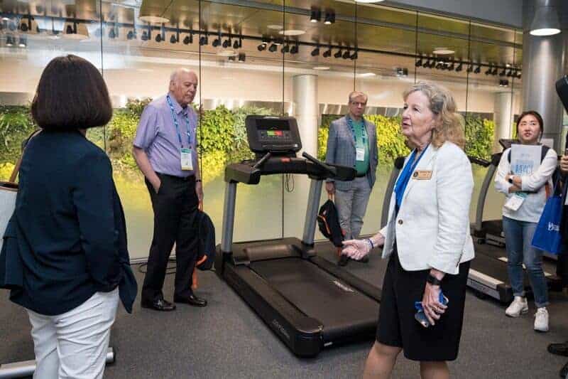 UD College of Health Sciences Dean Kathy Matt shows BIO 2019 visitors a physical therapy lab at STAR Campus.
